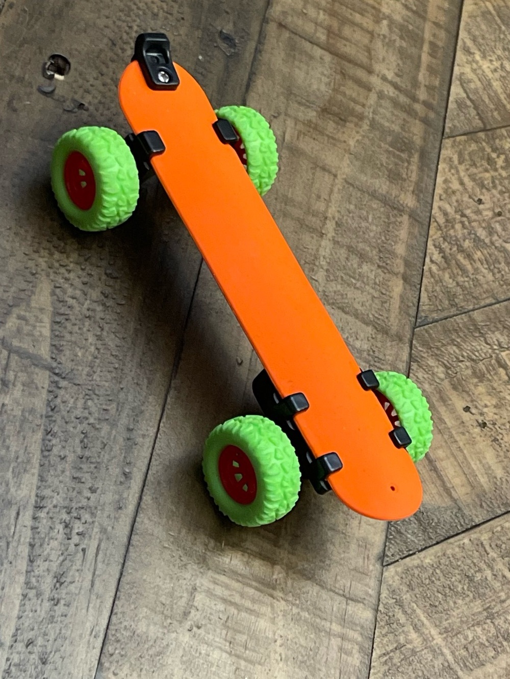 Pull-Back Skateboard Slap Bracelet, an innovative 2-in-1 novelty toy